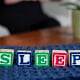 Child Blocks Spelling "Sleep"