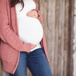 Expectant Mother Holding Belly